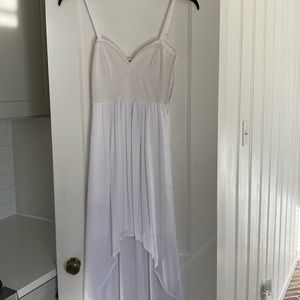 White, light and airy high low dress. Perfect for wedding showers, baby shower